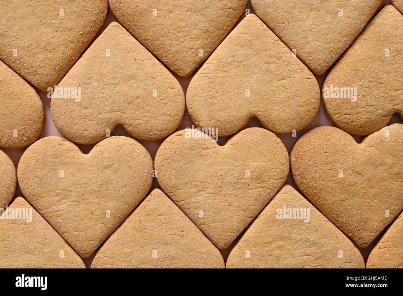 Le jour de la Saint-Valentin est composé de biscuits faits maison en forme de coeur. Banque D'Images