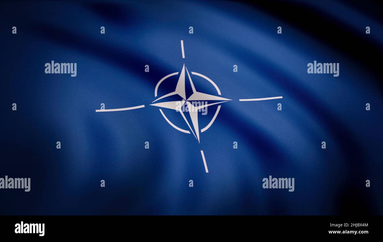 Drapeau de l'OTAN.Animation gros plan sur une toile ondulée de tissu bleu avec symbole blanc au centre.Symbole avec quatre faisceaux de vent en étoile blanc rose avec W divergent Banque D'Images