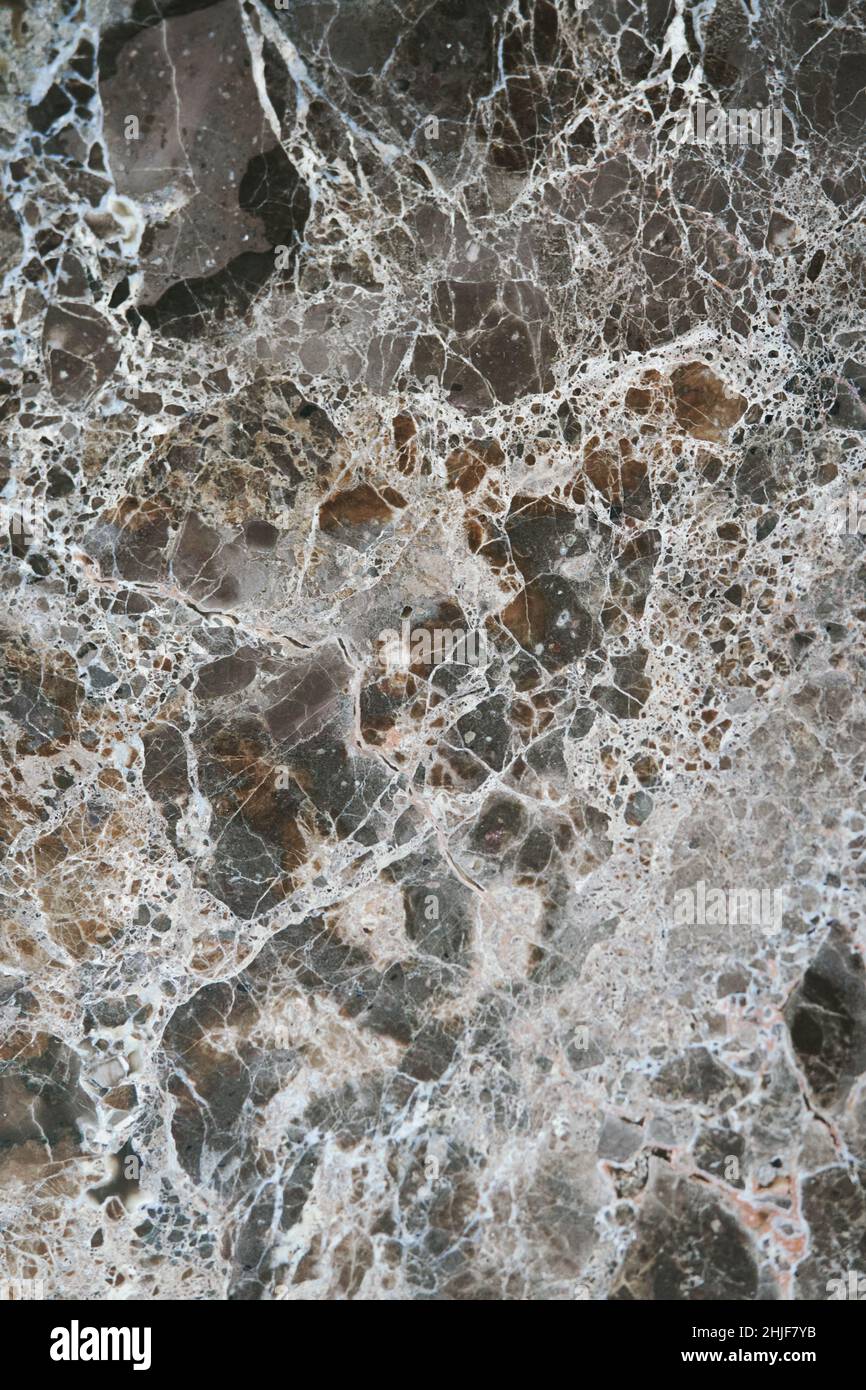 Arrière-plan en marbre naturel.Motifs abstraits en granit gris et brun foncé avec texture marbre.Tons ocre chaleureux et tendance Banque D'Images