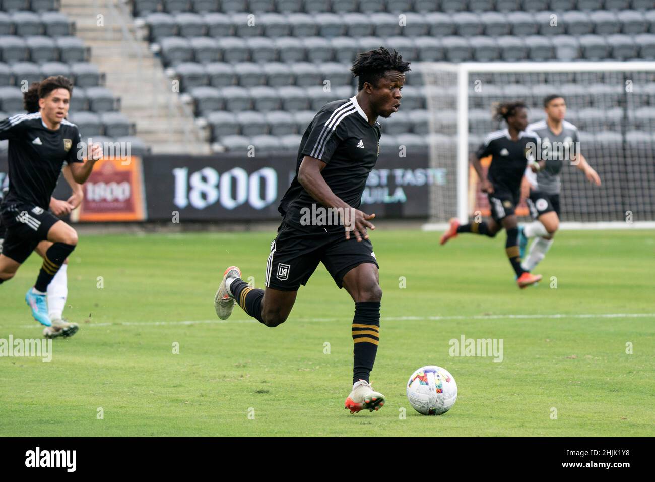 Le Los Angeles football Club a avancé Kwadwo Opoku (22) lors d'un match de football de pré-saison MLS entre le Los Angeles football Club et le New England Revo Banque D'Images