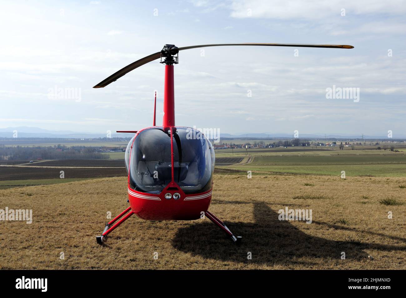 Robinson R44, hélicoptère, transport aérien, rouge, navigation,Cockpit, pilote, Robinson Helicopter Company, Robinson R44 hélicoptère Banque D'Images