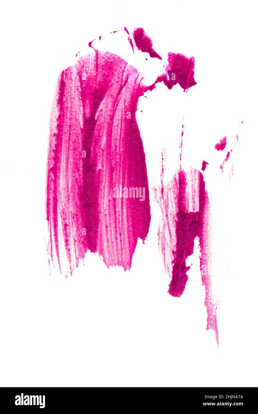 La tache verticale du rouge à lèvres se distingue par un fond blanc.Couleur cramoisi d'un produit cosmétique avec de l'espace à copier.Photo de haute qualité Banque D'Images