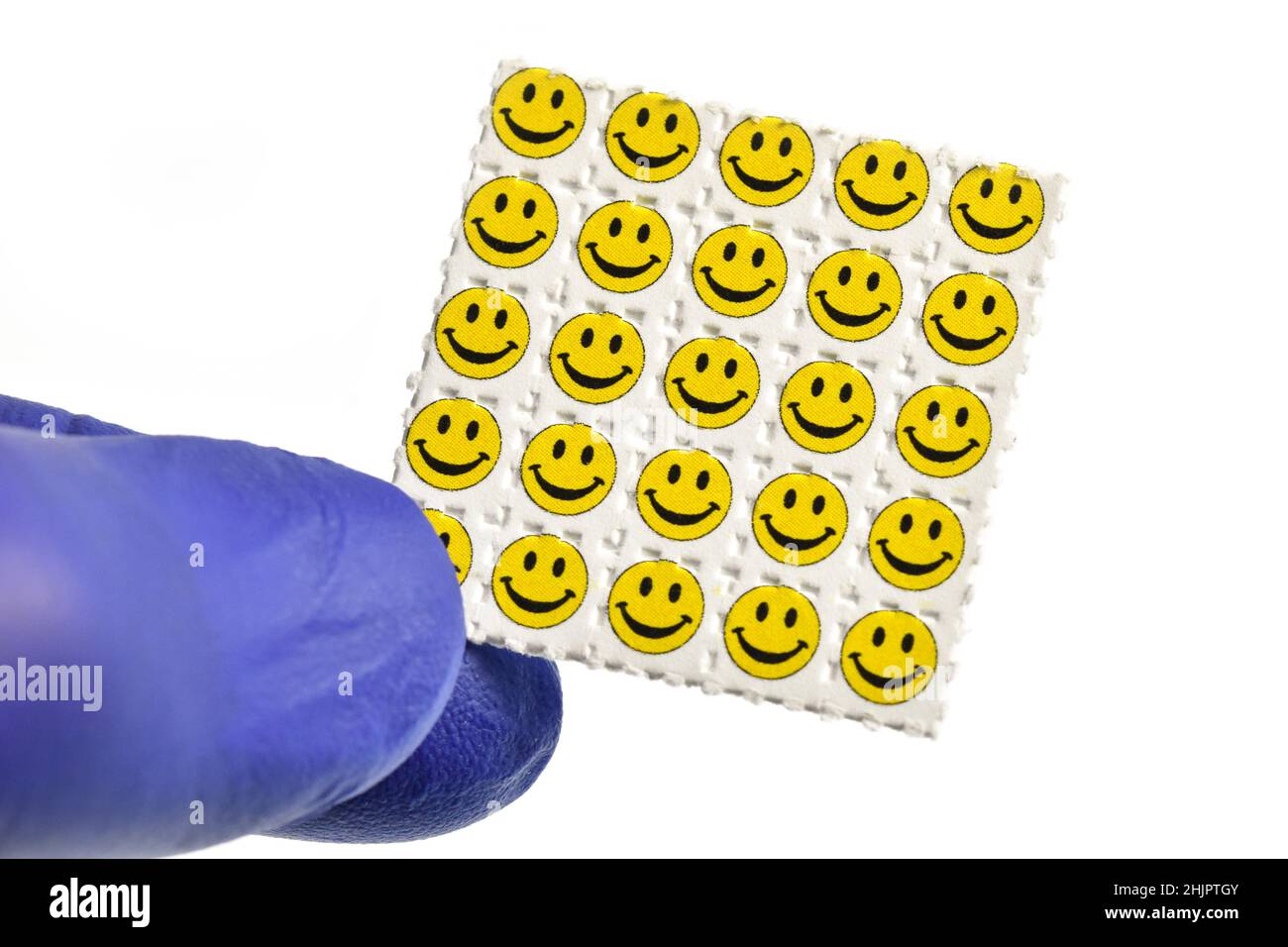 Smiley visage acide trébuchements, papier buvard imprégné de la drogue L. NSVAC- acide lysergique diéthylamide. Banque D'Images