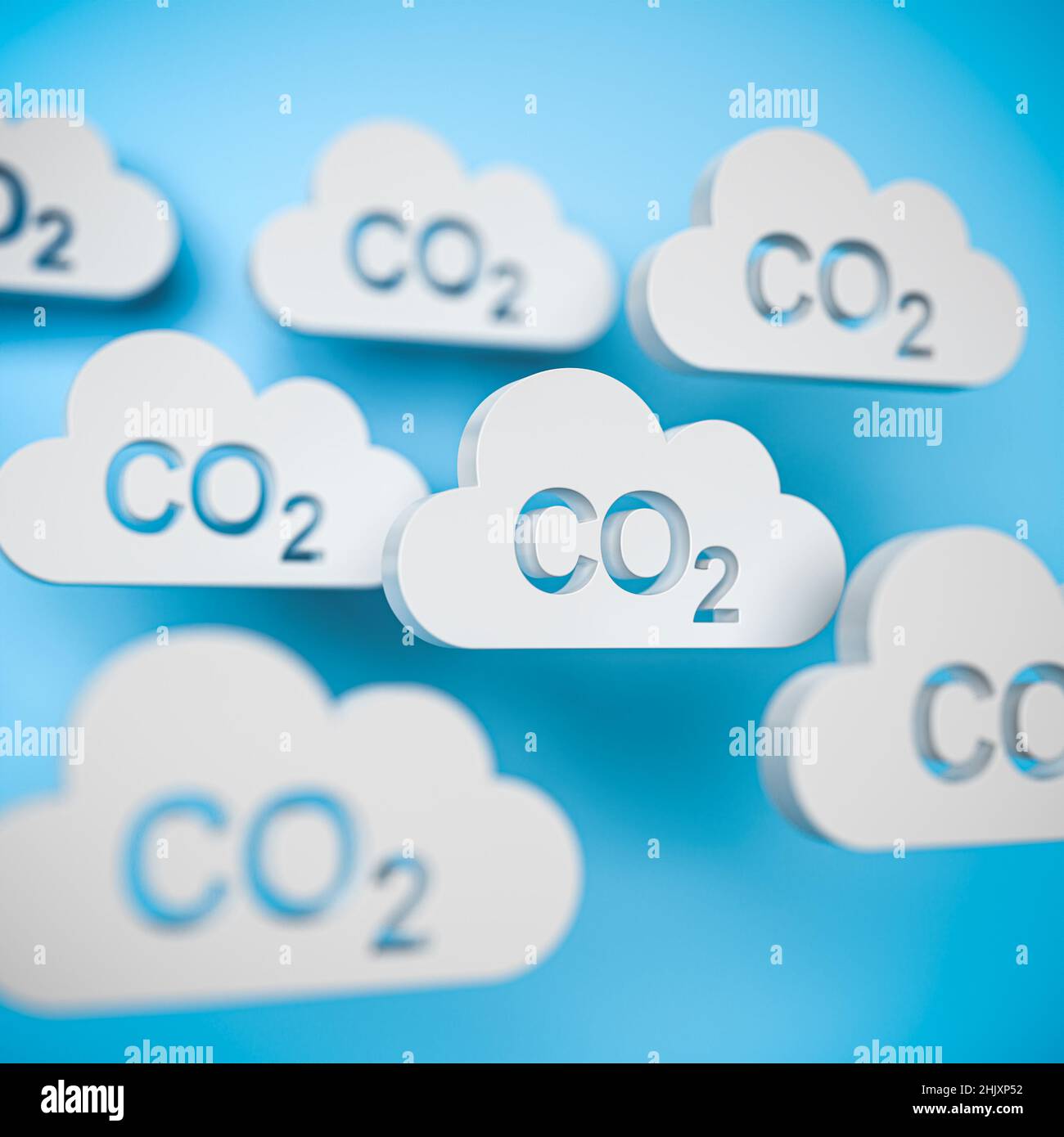 CO2 concept.Plusieurs objets en forme de nuage avec le mot CO2 perforé devant un fond bleu. Banque D'Images