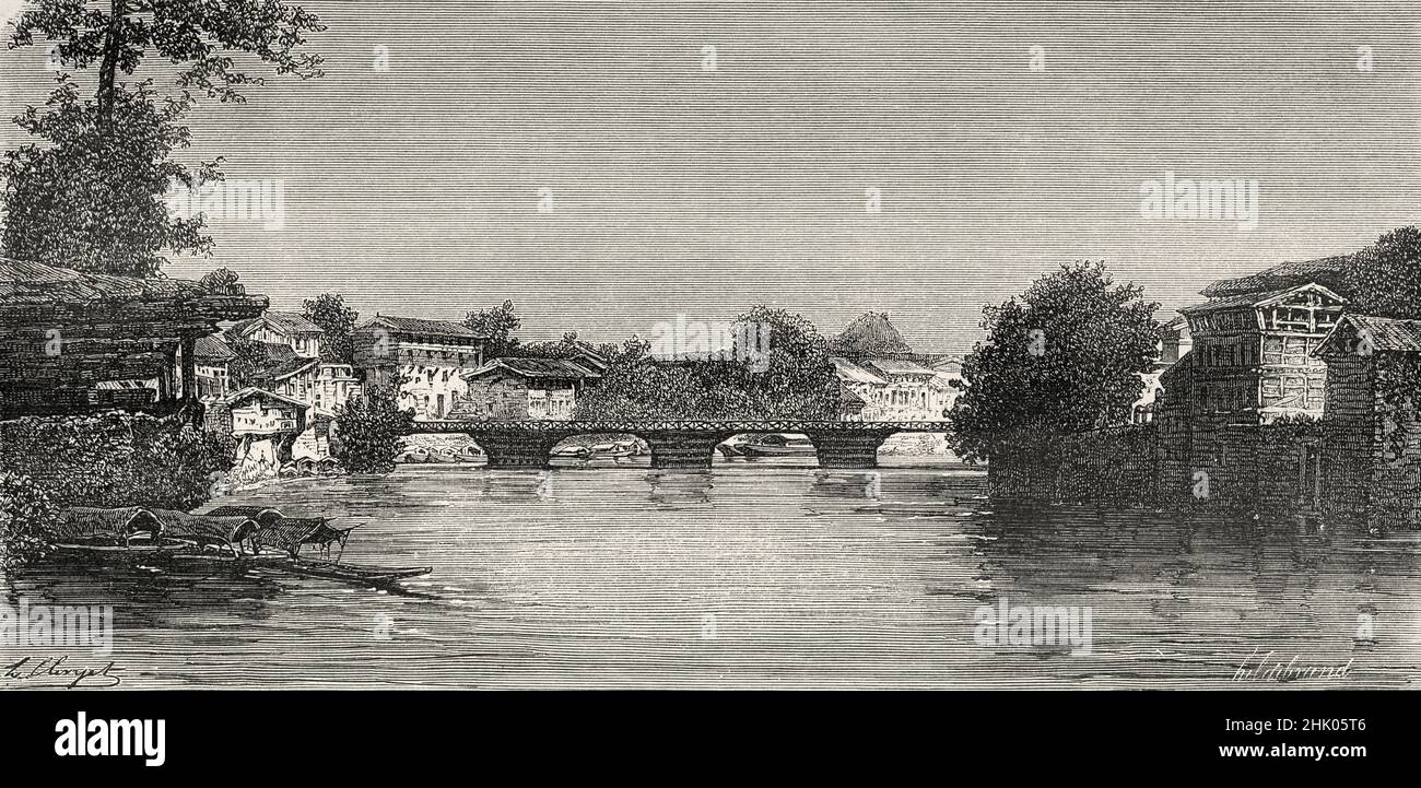 Pont sur la rivière Jhelum, Srinagar, Cachemire.Inde, Asie.Vieux 19th siècle, illustration gravée du voyage au Punjab et au Cachemire par Guillaume Lejean, le Tour du monde 1870 Banque D'Images