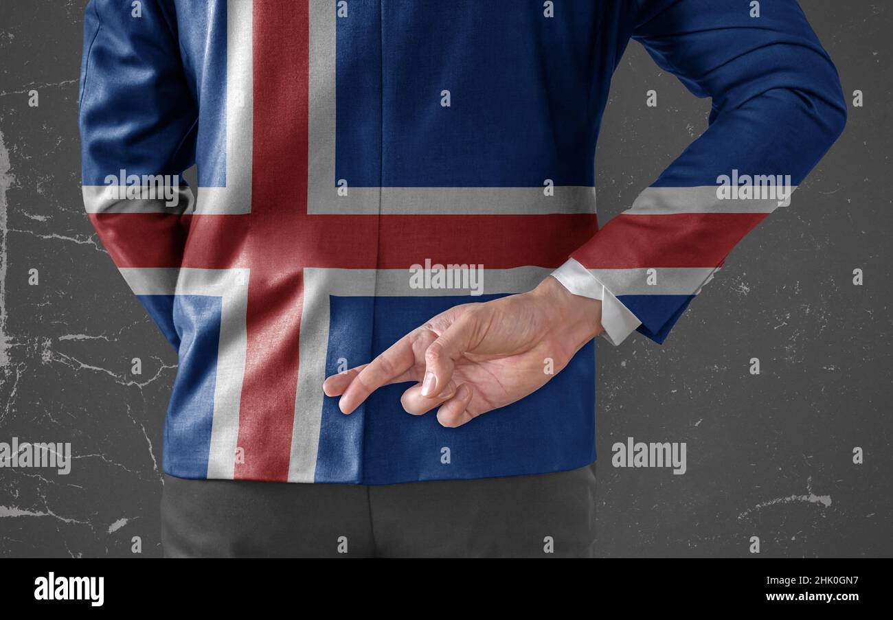 Veste d'homme d'affaires avec drapeau d'Islande avec ses doigts croisés  derrière son dos Photo Stock - Alamy