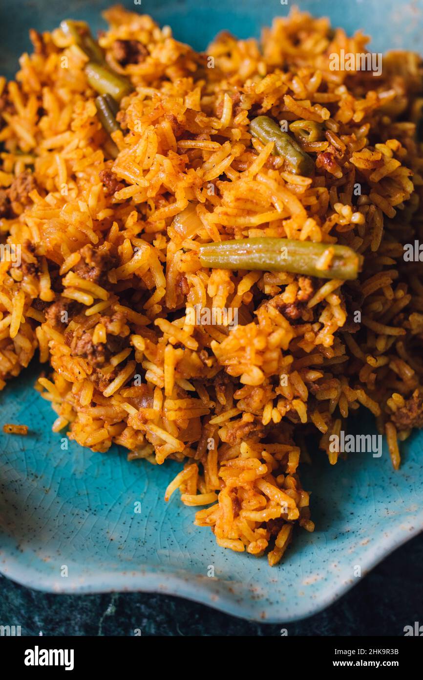 Lubia polo plat de riz persan avec boeuf haché, haricots verts, curcuma  Photo Stock - Alamy