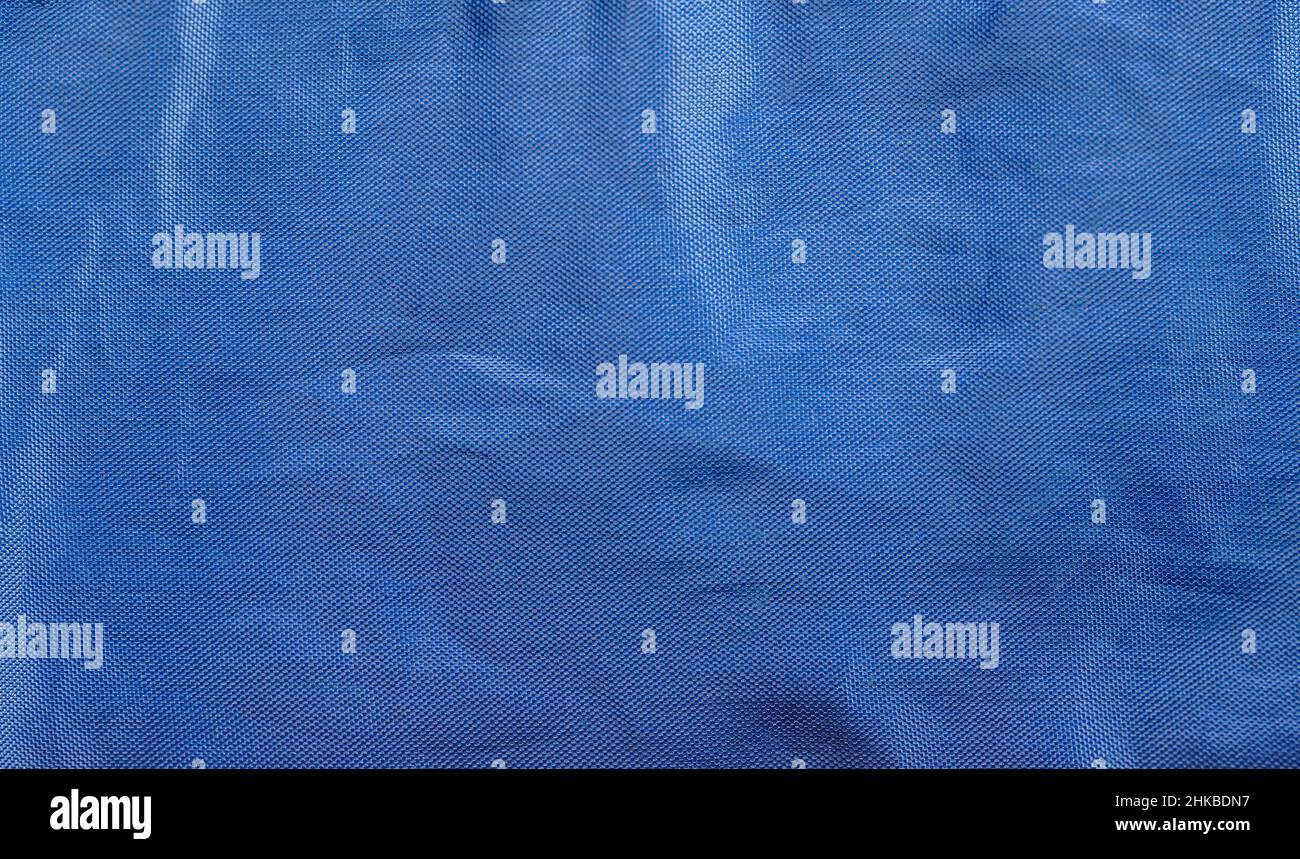 arrière-plan abstrait de la texture bleue du tissu gros plan Banque D'Images