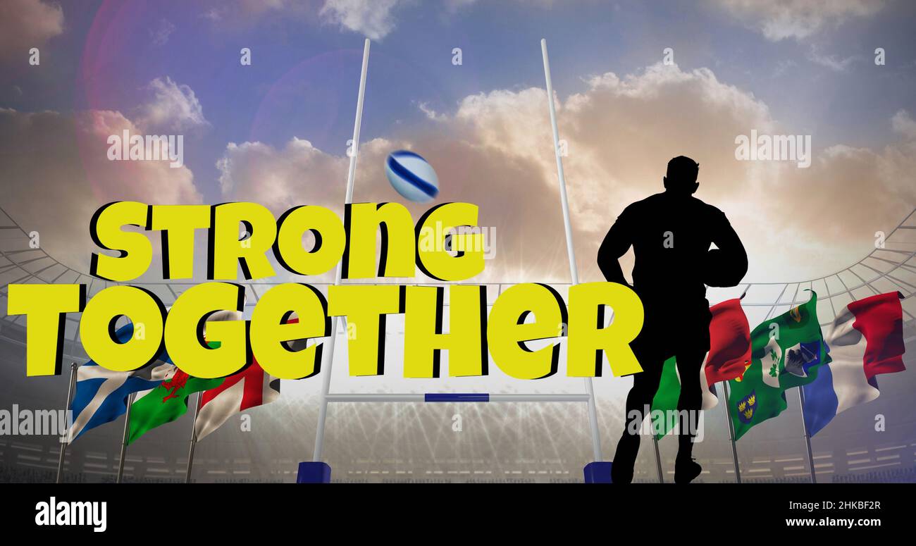 Image composite numérique de texte « Strong Together » avec un sportif de silhouette et des drapeaux contre le ciel Banque D'Images