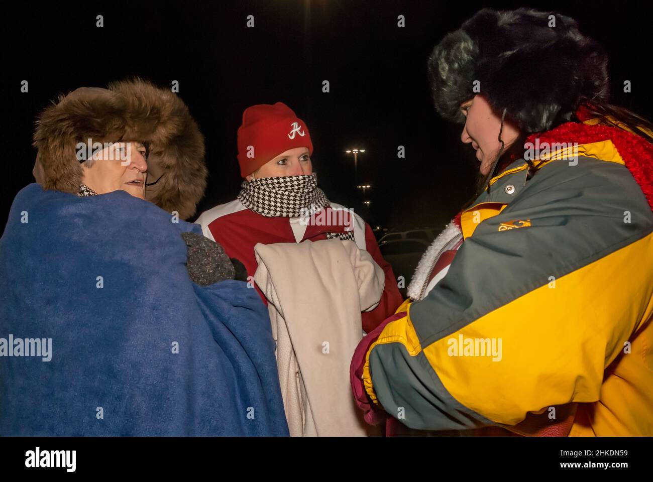 Les fans de football Crimson Tide attendent de féliciter l'équipe pour la victoire au championnat national, le 8 janvier 2010, à Tuscaloosa, Alabama. Banque D'Images