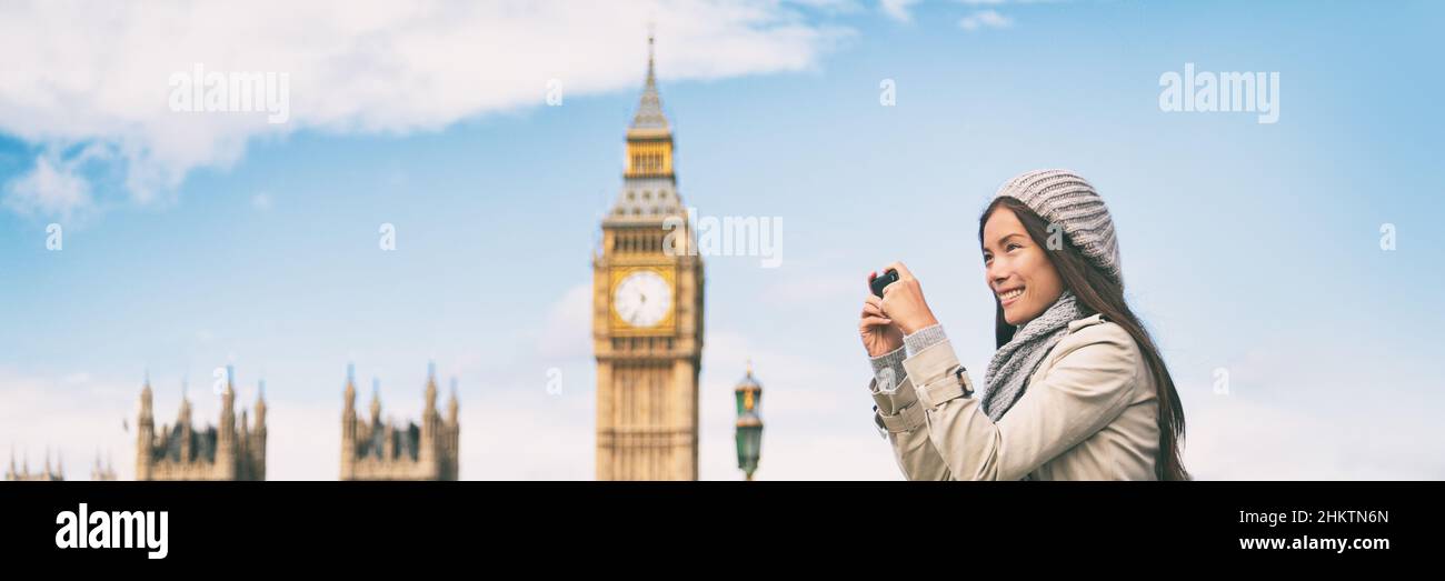 Londres europe Voyage femme prenant des photos avec téléphone bannière panorama. Tourisme tenant un appareil photo pour smartphone prenant des photos à Big Ben, Westminster Bridge Banque D'Images