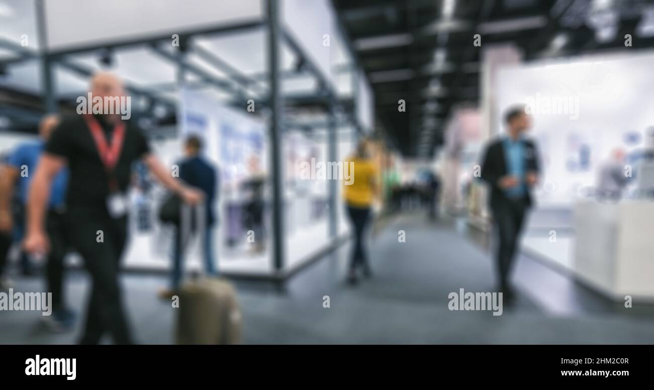 Résumé personnes brouillées dans la salle d'exposition utilisation de fond d'événement Banque D'Images