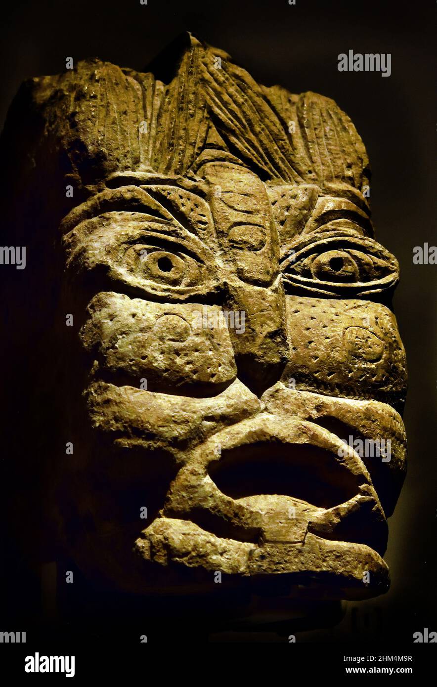 Sculpture en forme de tête grotesque, représentant éventuellement le dieu égyptien BES, qui repousse les mauvais esprits, Pierre / calcaire, 28,9 x 17 x 23,2 cm, période byzantine 395–642 ce, Egypte (Museo Egizio di Torino Italie) Banque D'Images