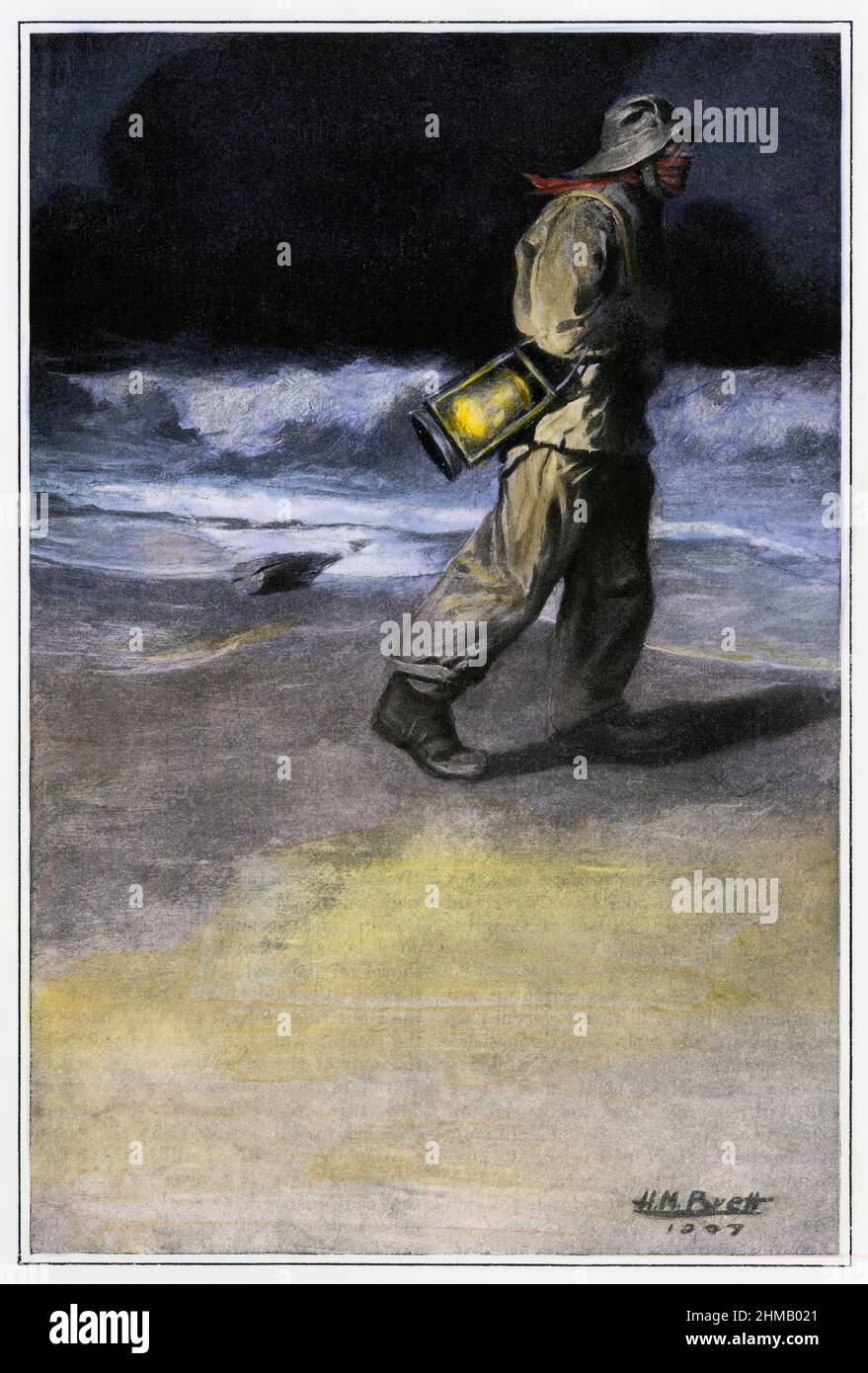 US Life-Saving Service Surfman patrouille sur la côte de Cape Cod, début 1900s. Demi-teinte de couleur main d'un H.H. Illustration Brett Banque D'Images