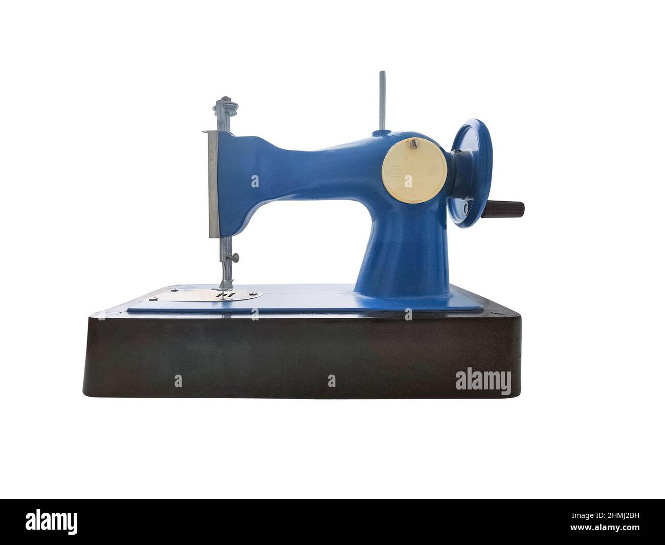 Ancienne machine à coudre rétro pour enfants isolée sur fond blanc. Banque D'Images