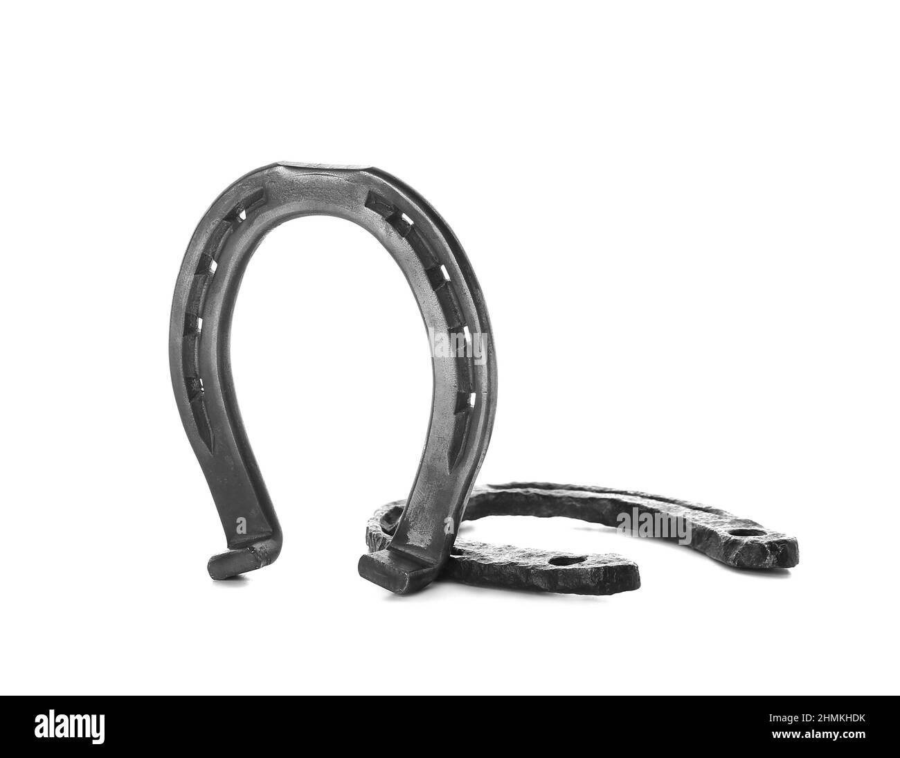 Repasser les fers à cheval sur fond blanc Banque D'Images