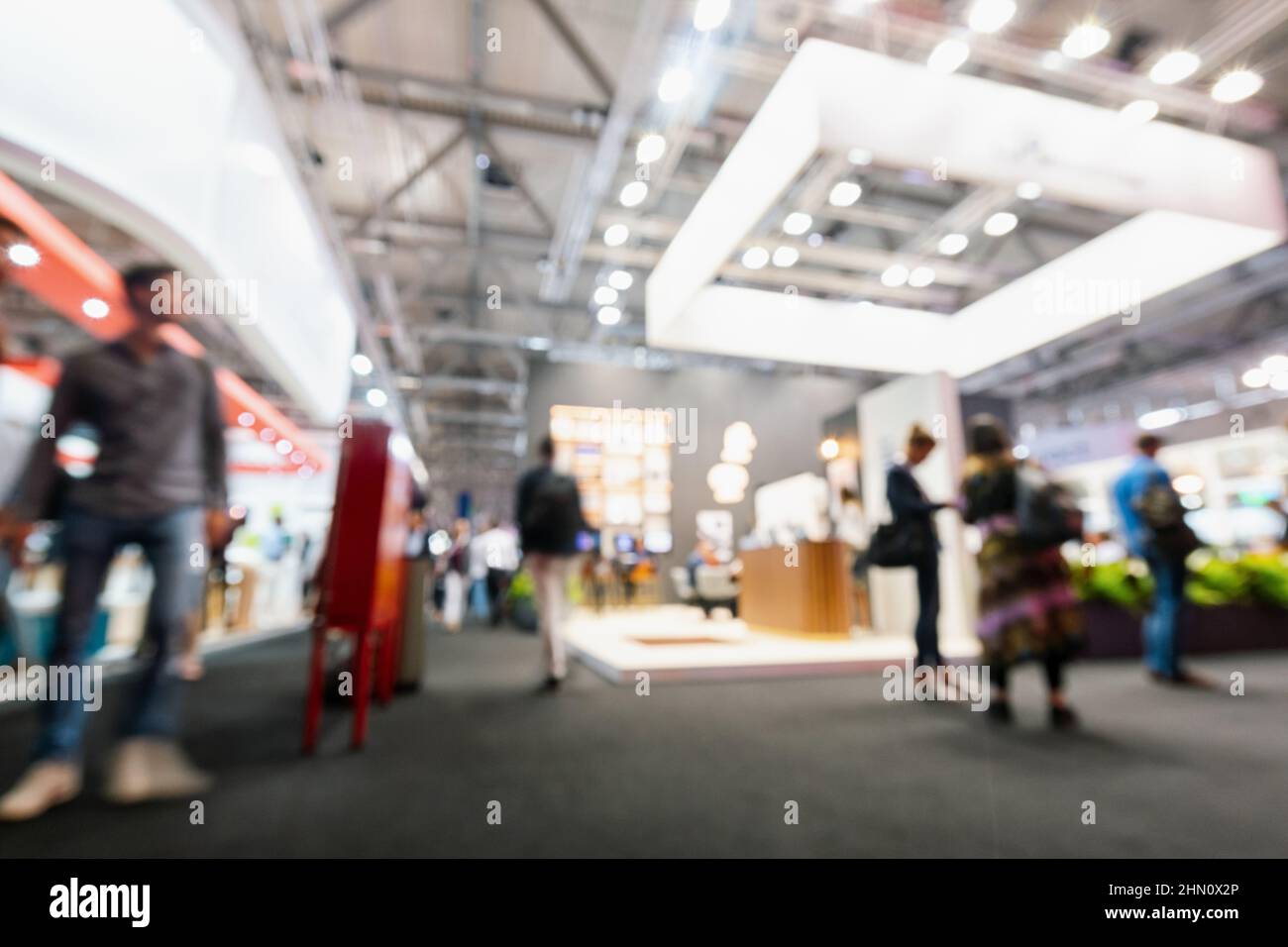 Flou, flou, déshoqué hommes d'affaires International Tradeshow arrière-plan Banque D'Images