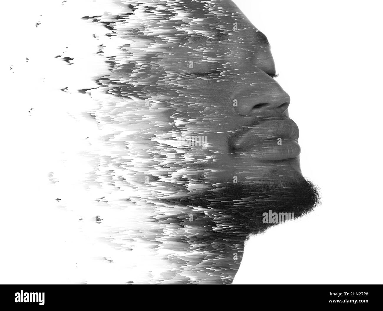 Un portrait noir et blanc d'un homme avec une distorsion visuelle. Double exposition. Banque D'Images