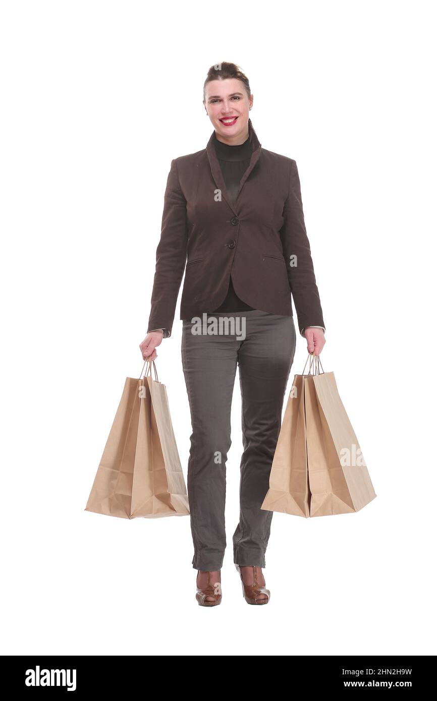 Happy young woman with shopping bags sur fond blanc Banque D'Images