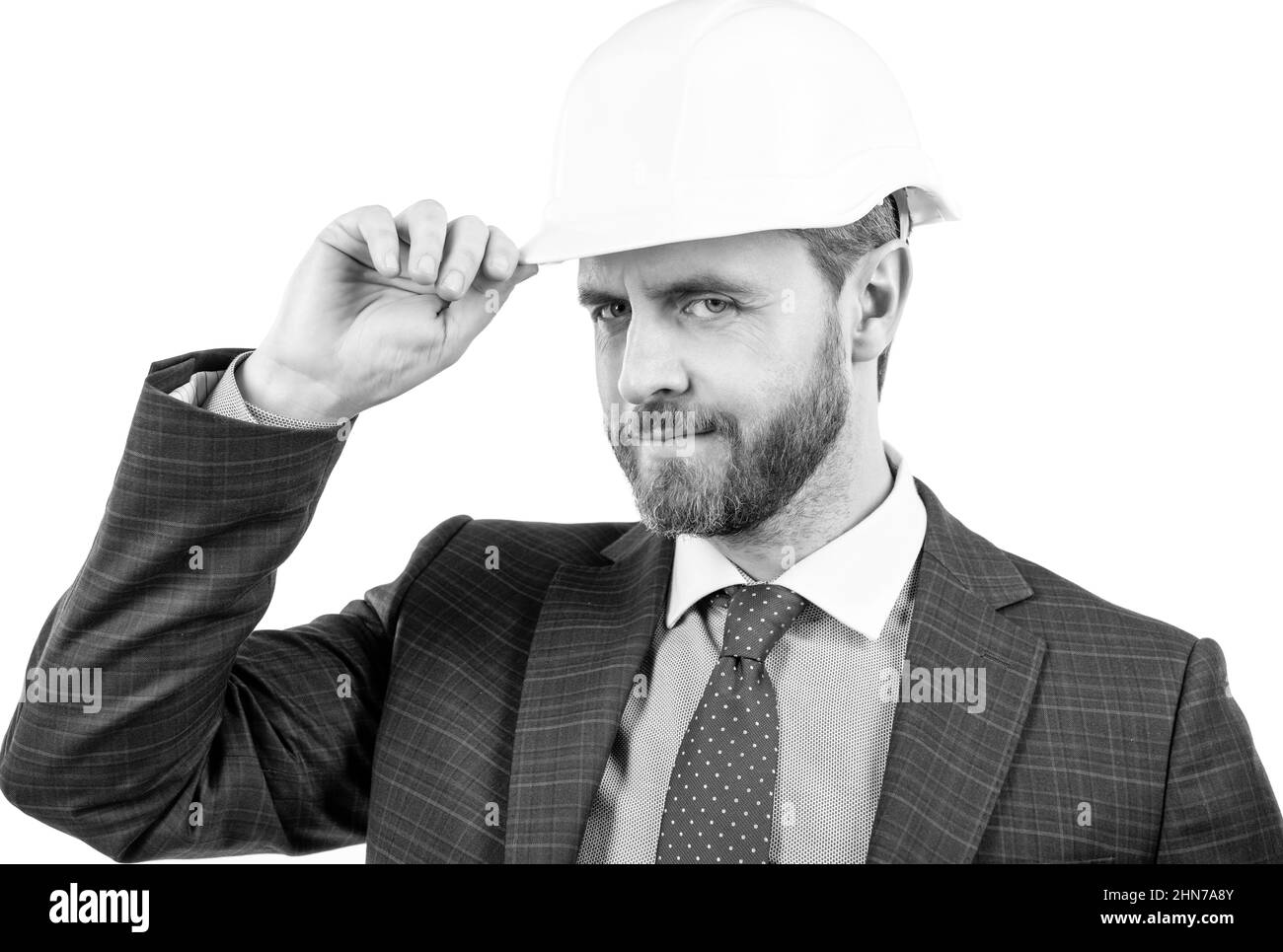 entreprise de sécurité. homme réussi avec geste de salutation. entrepreneur dans casque de protection. Banque D'Images