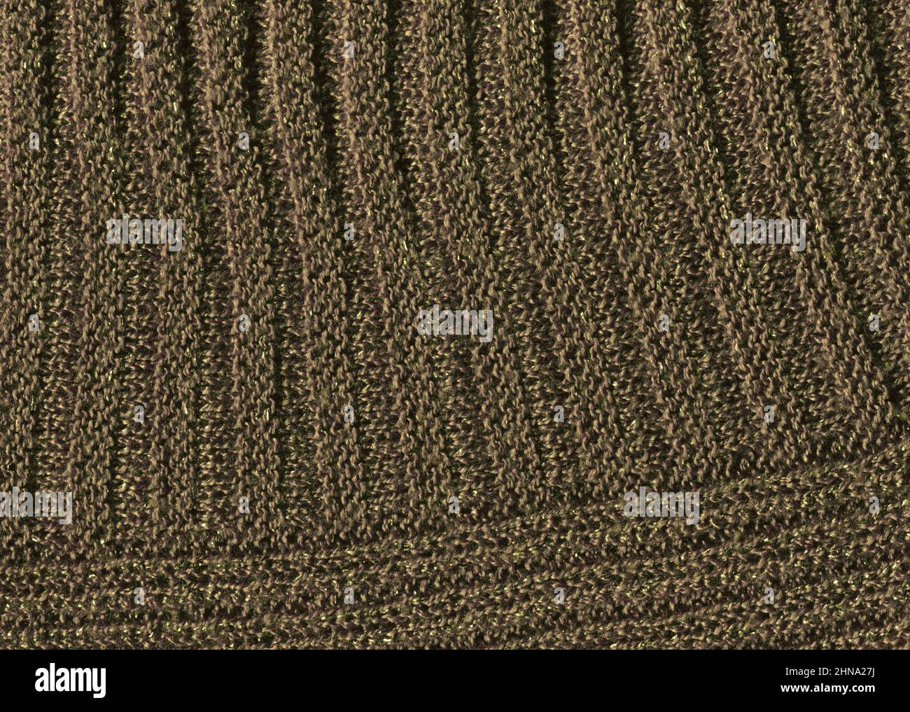 Texture du pull en laine de couleur café.Tissu en laine tricoté vermillon brun fait main Banque D'Images