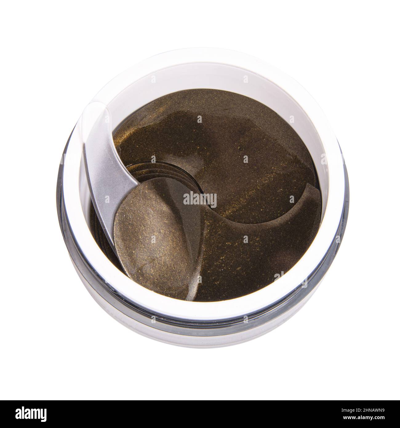 Taches oculaires cosmétiques sombres dans une boîte isolée sur fond blanc Banque D'Images