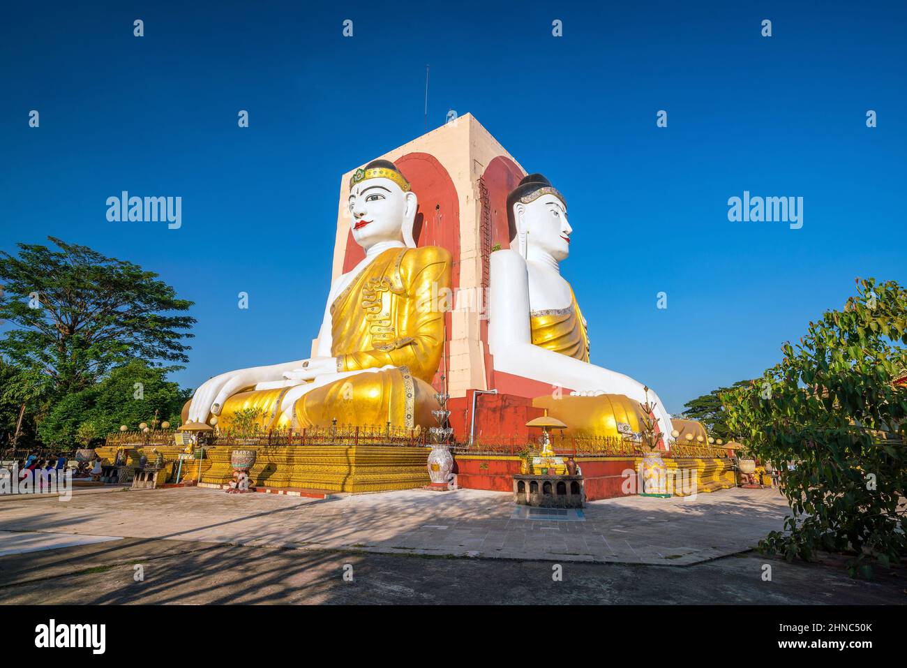 Quatre visages de Bouddha au Bouddha Kyaikpun à Bago, Myanmar Banque D'Images