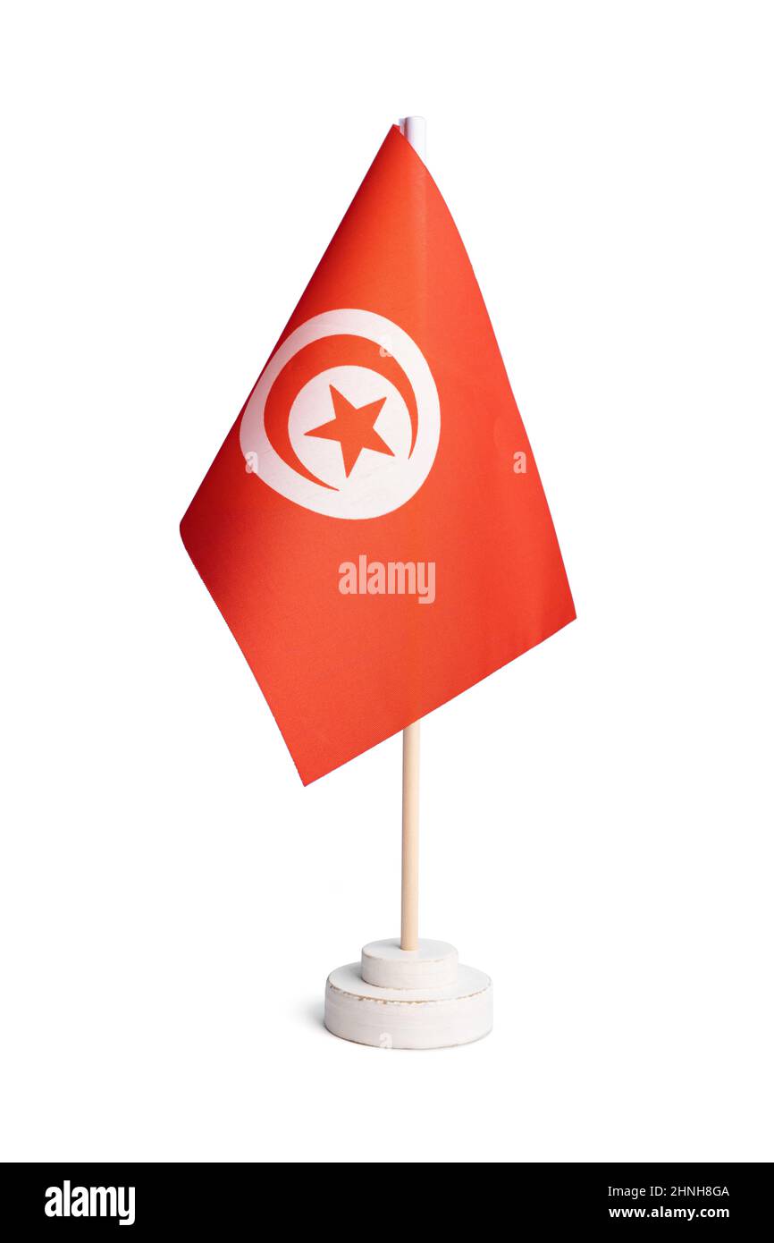 Petit drapeau de table de Tunisie isolé sur fond blanc Banque D'Images