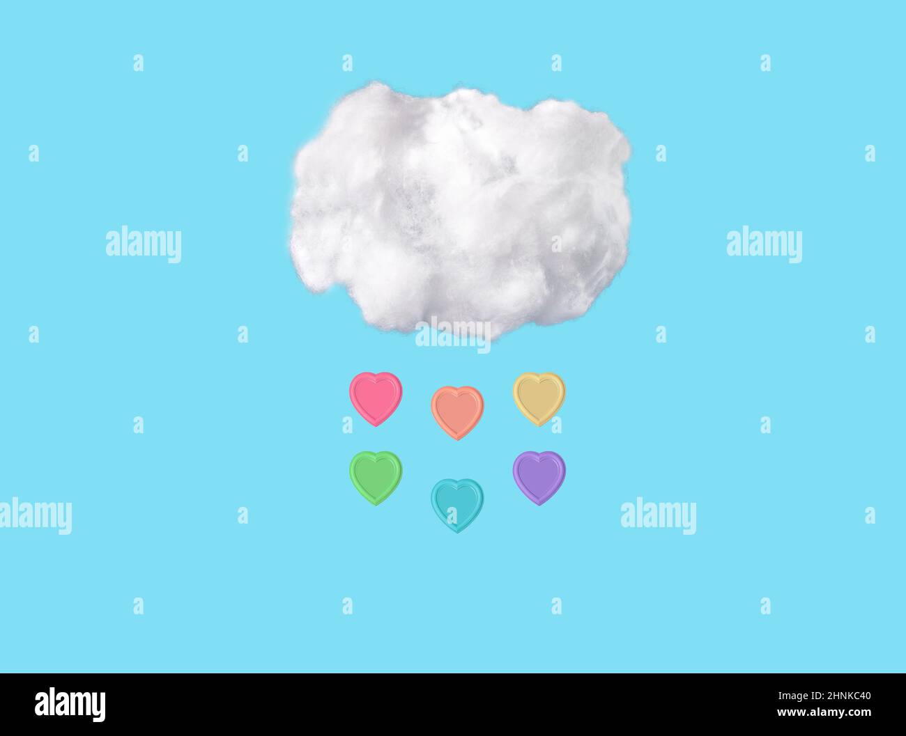 Nuages de coton et gouttes de pluie à coeur coloré sur fond bleu ciel dans un style surréaliste drôle. Météo printanière. Photo de haute qualité. Concept LGBT Banque D'Images