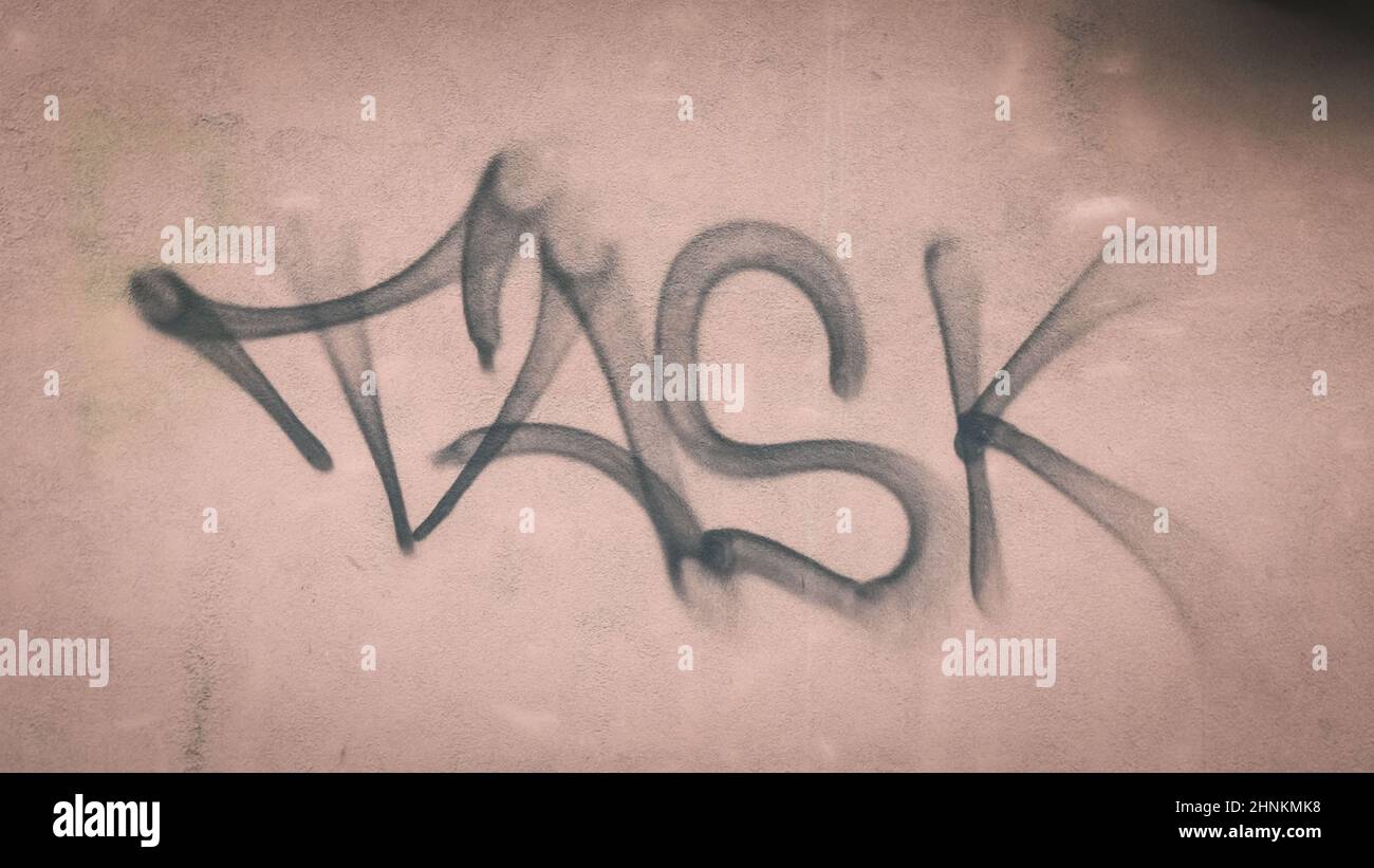 Mot TASK sur le mur couleur de la griseté Banque D'Images