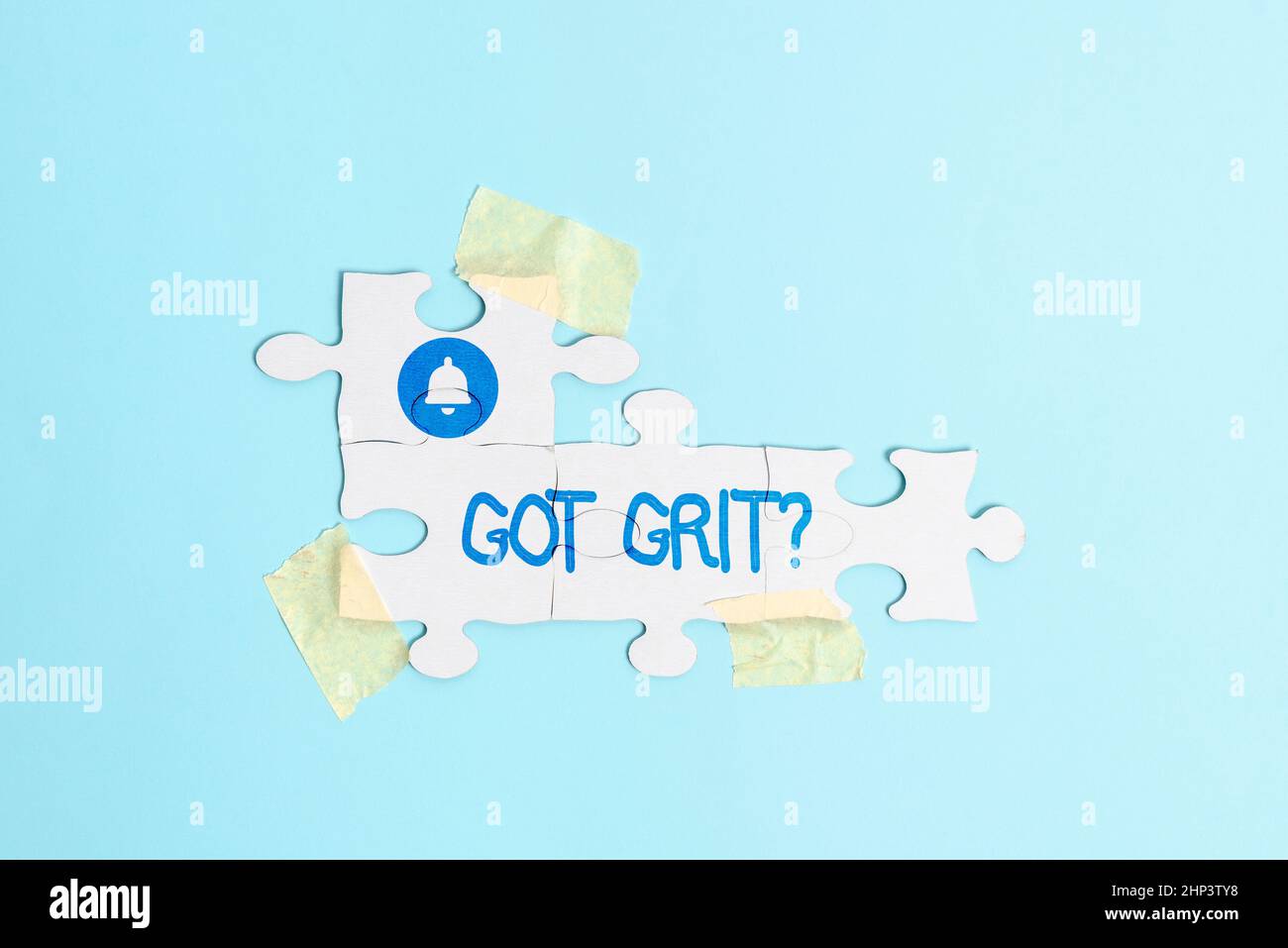 L'écriture affichant le texte obtenu Grit question, concept signifiant Un travail acharné avec persévérance vers le but désiré construire un Jigsaw blanc non fini P Banque D'Images