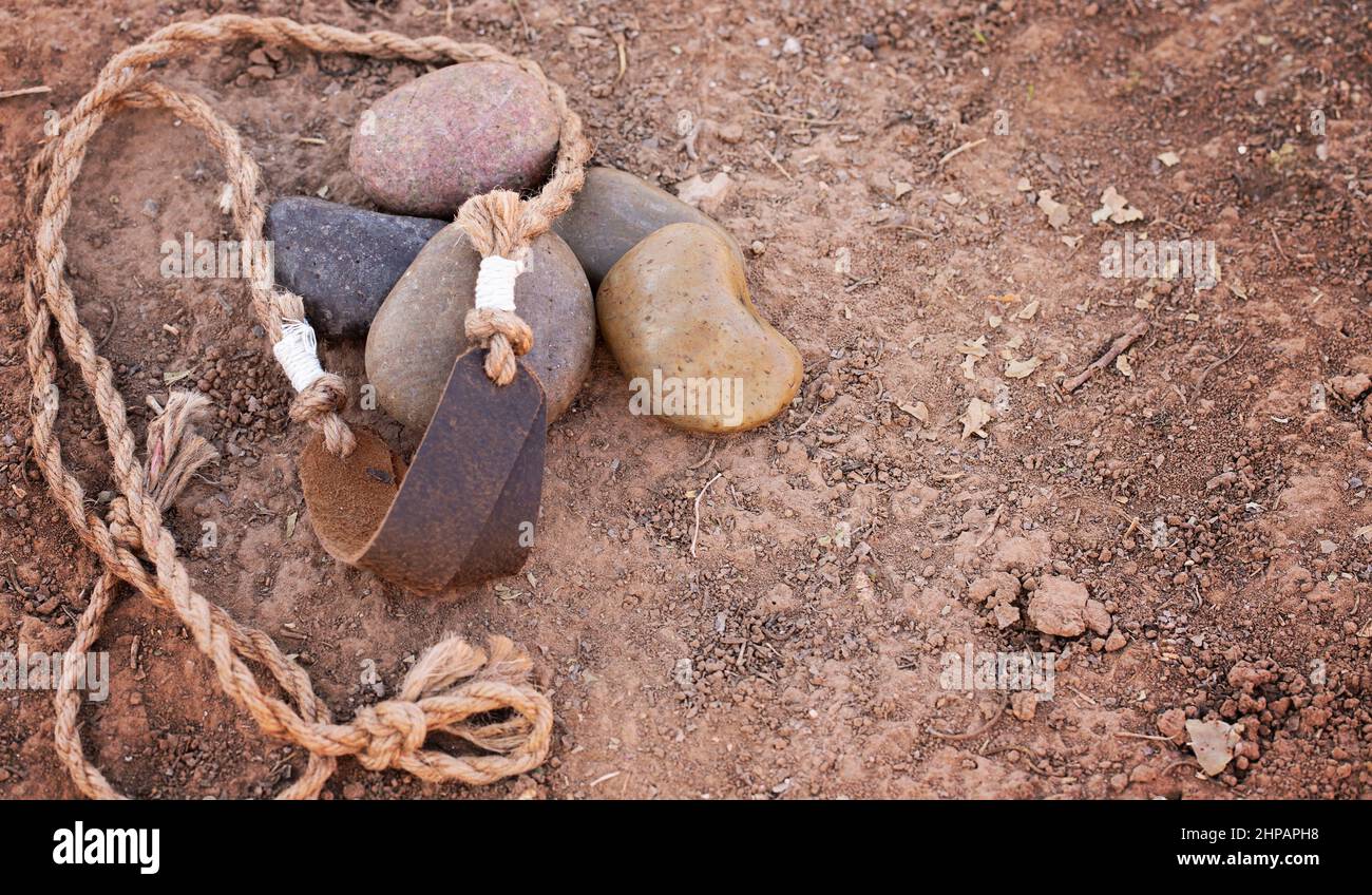 Elingue de David avec cinq pierres lisses une histoire de la Bible Banque D'Images