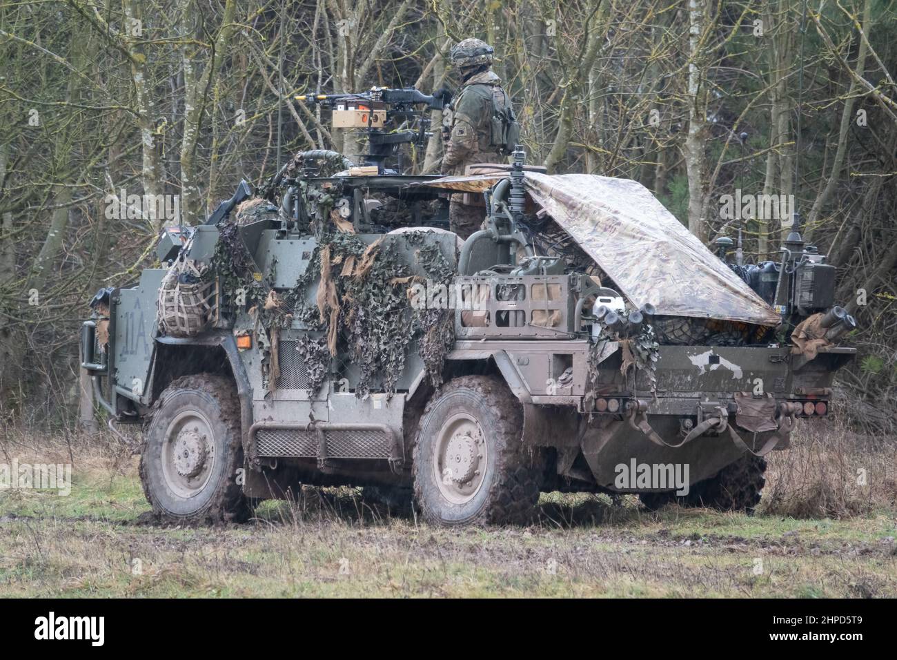 L'armée britannique Supacan Jackal 4x4 d'assaut rapide, de soutien au feu et de véhicules de reconnaissance lors d'un exercice militaire d'entraînement de combat, Wiltshire Royaume-Uni Banque D'Images