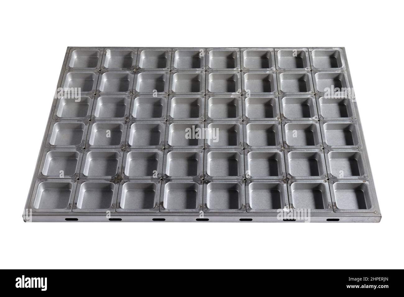 Moule à gâteau sur fond blanc. Professions: Pâtisserie. Banque D'Images