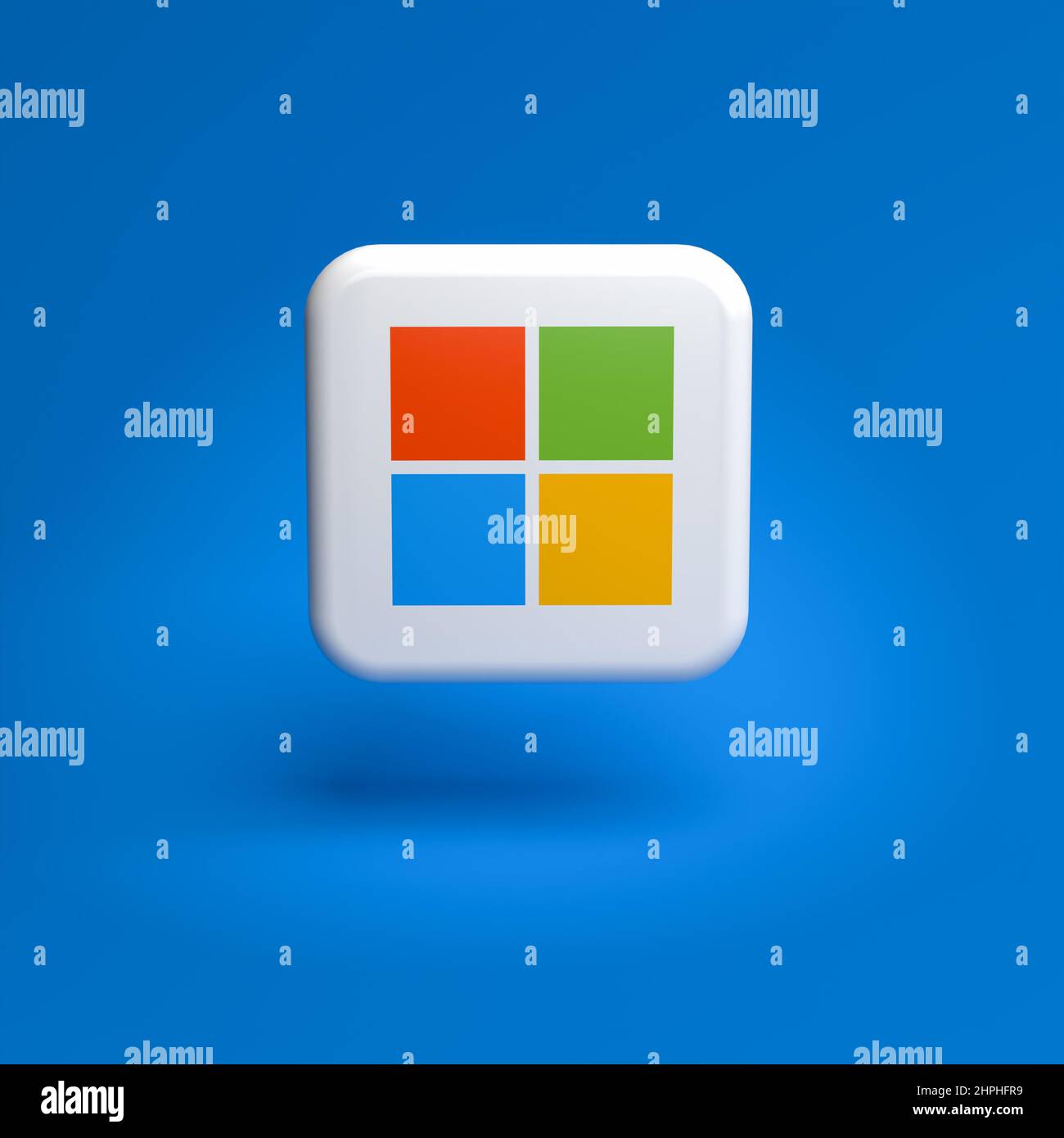 Logo de la société de technologie Microsoft sur une tuile survolant un fond bleu sans couture Banque D'Images