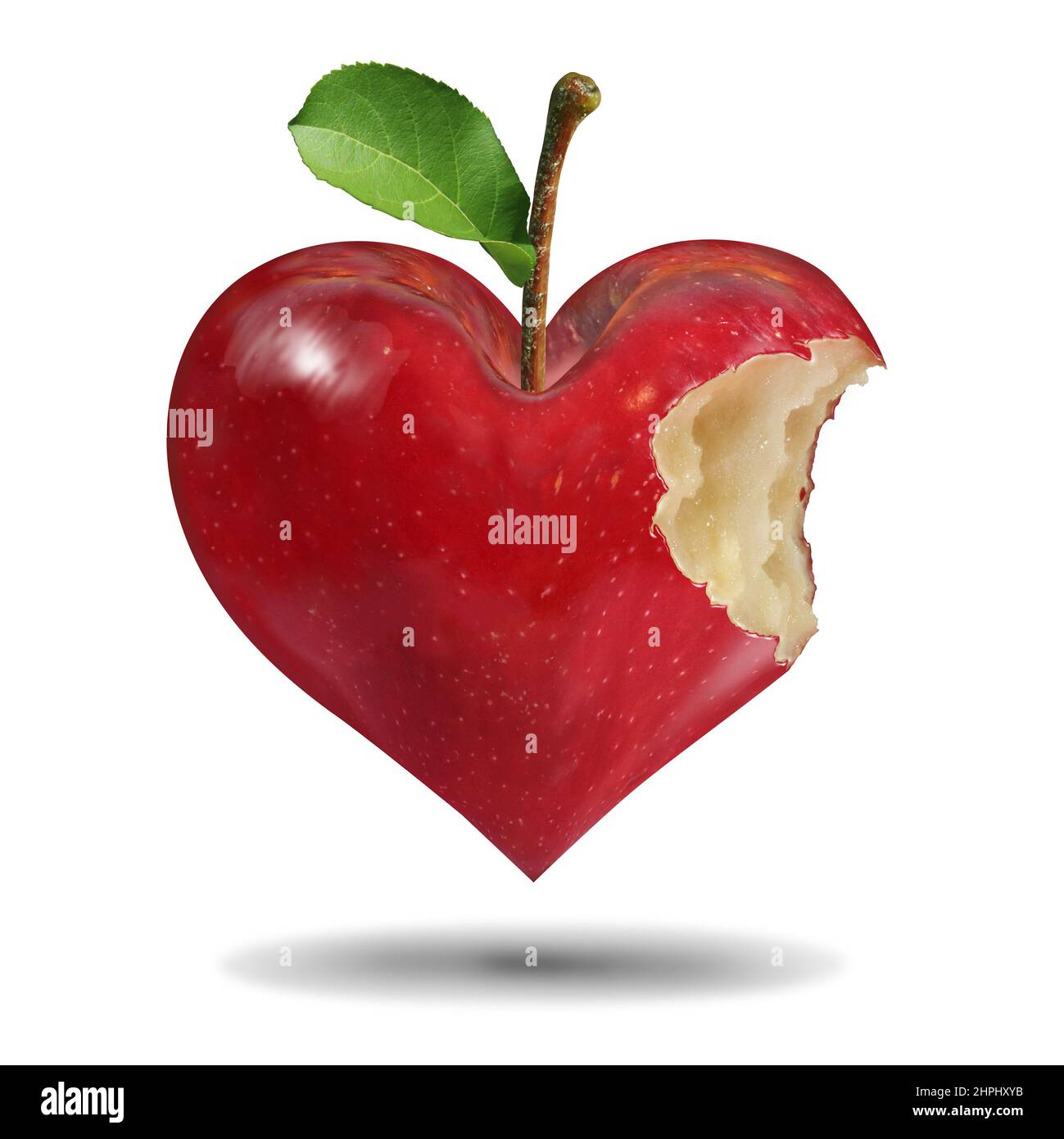 Symbole de la vie saine et manger une bonne nutrition comme une pomme rouge avec une morsure mangé dans un coeur d'amour pour vivre un concept de style de vie adapté. Banque D'Images