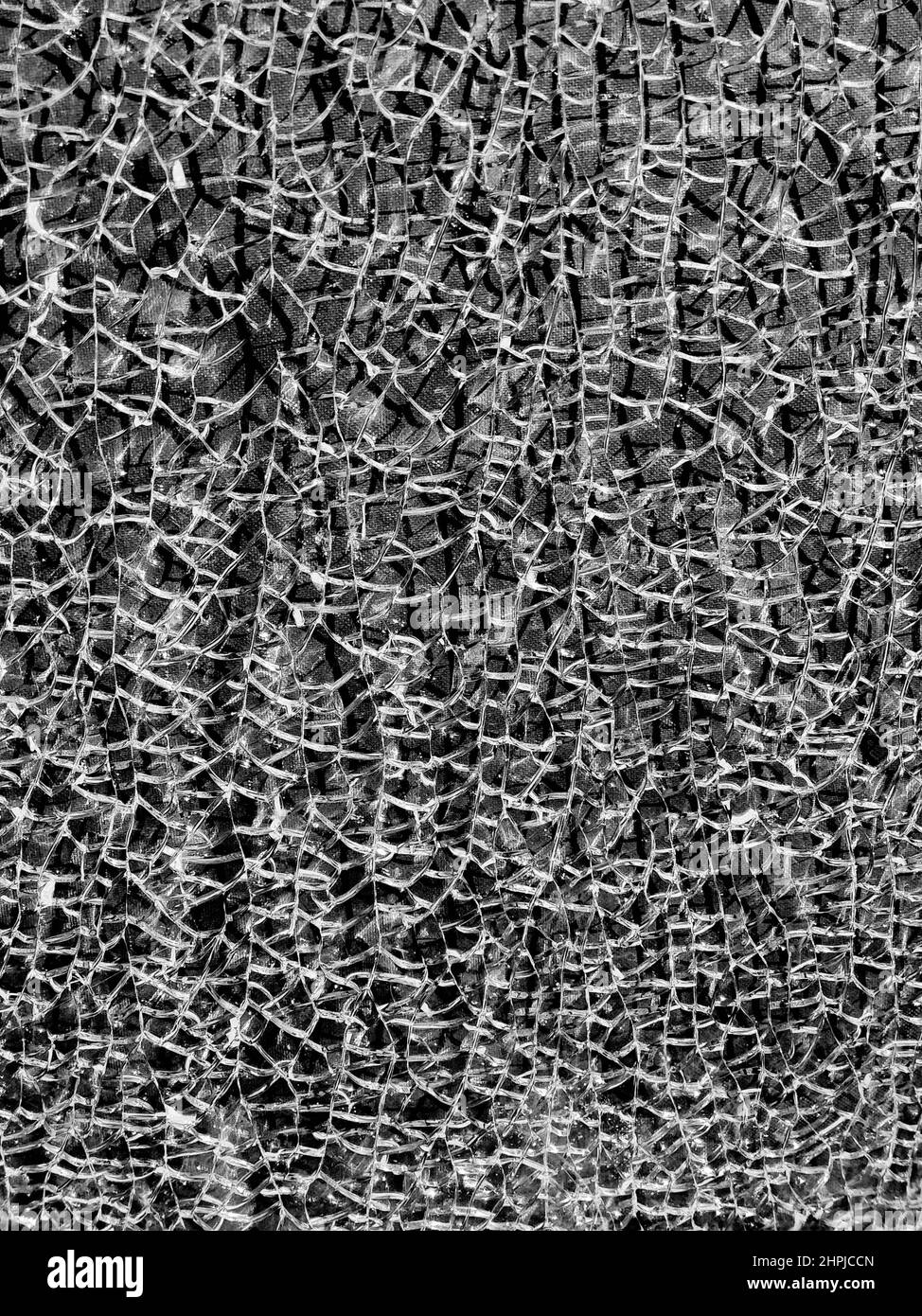 Texture verre cassé avec fissures. Résumé de l'écran fissuré smartphone de choc Banque D'Images