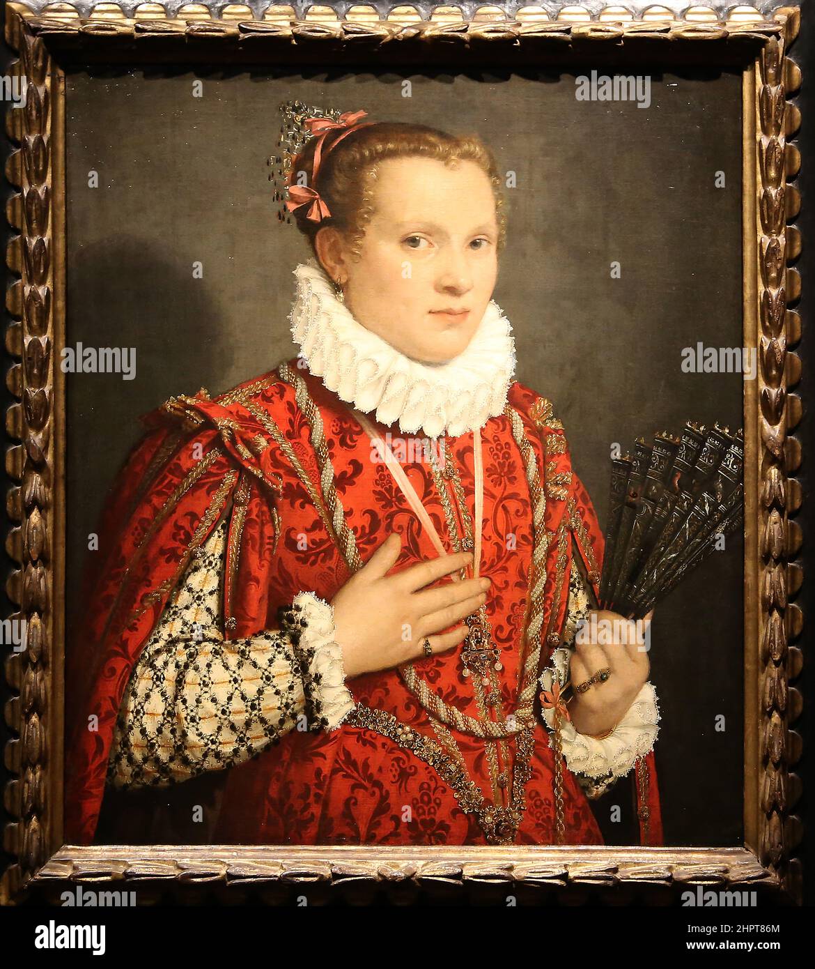 Portrait. Jeune femme tenant un fan. Par Giovanni Battista Moroni (1520-1579). Bergame, Italie, c. 1575. Huile sur toile. Rijksmuseum. Amsterdam. Banque D'Images
