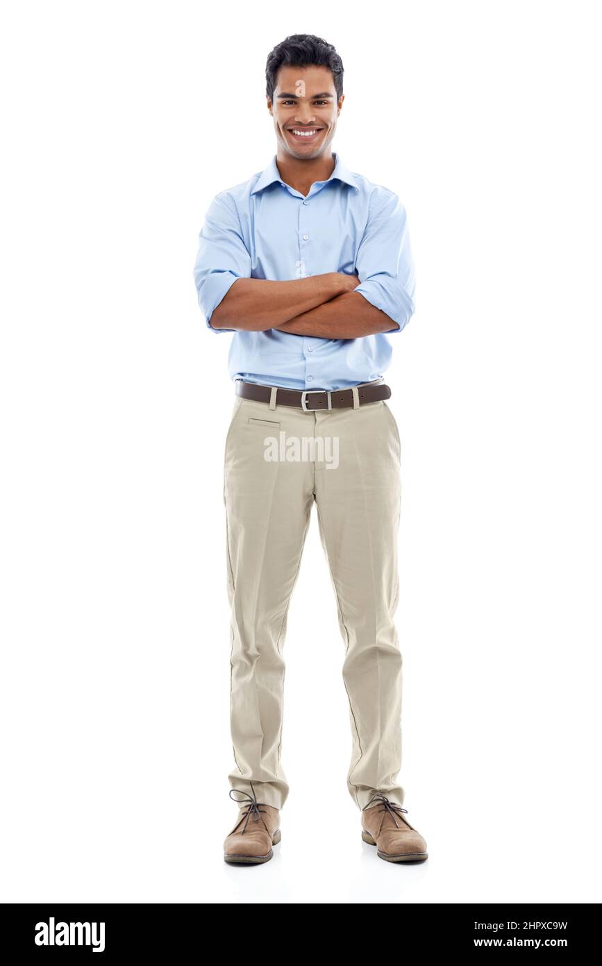 HES a eu ce grand sourire. Studio portrait d'un beau jeune homme isolé sur blanc. Banque D'Images