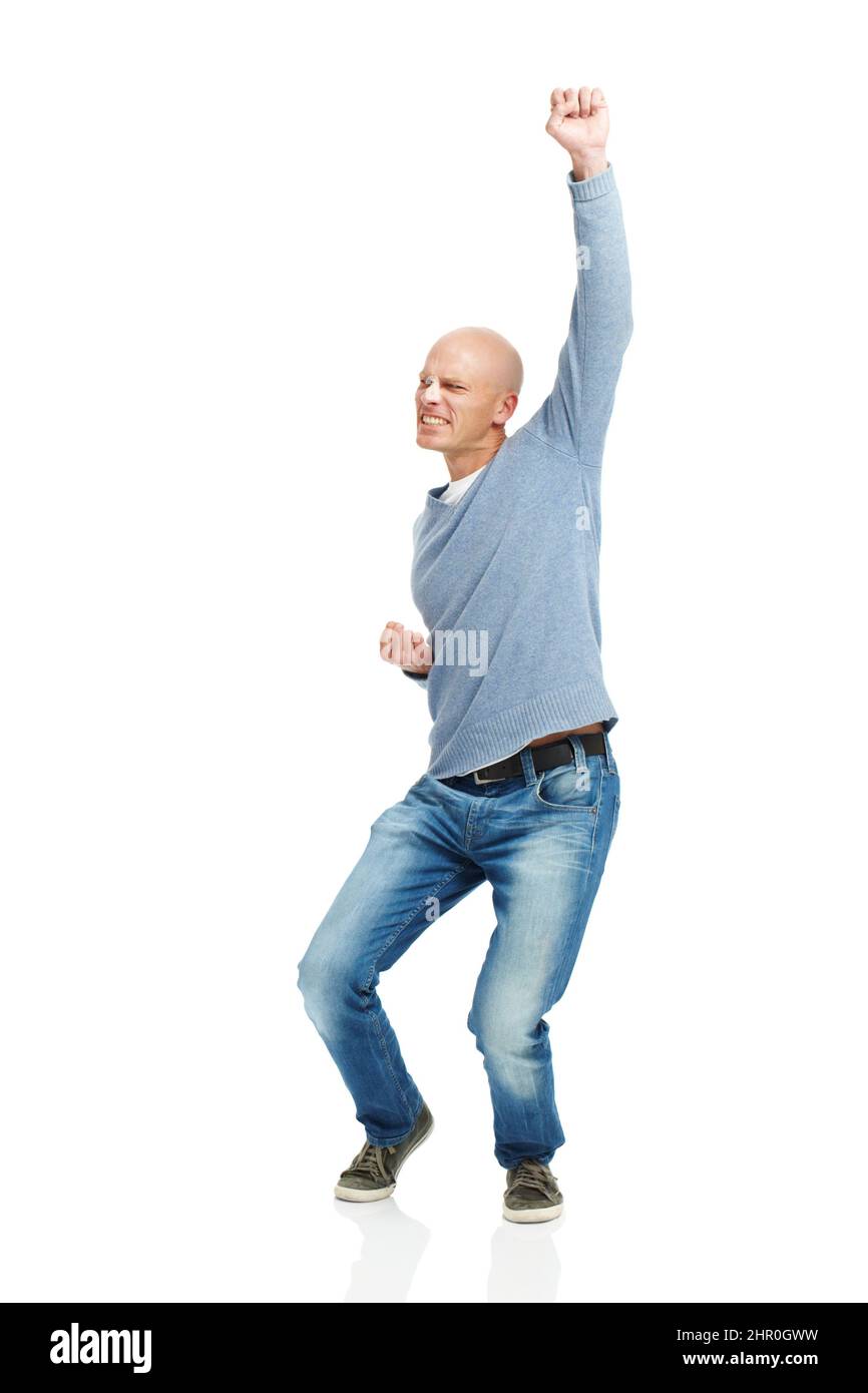 Vivre son style de vie. Studio photo d'un beau jeune homme isolé sur blanc. Banque D'Images