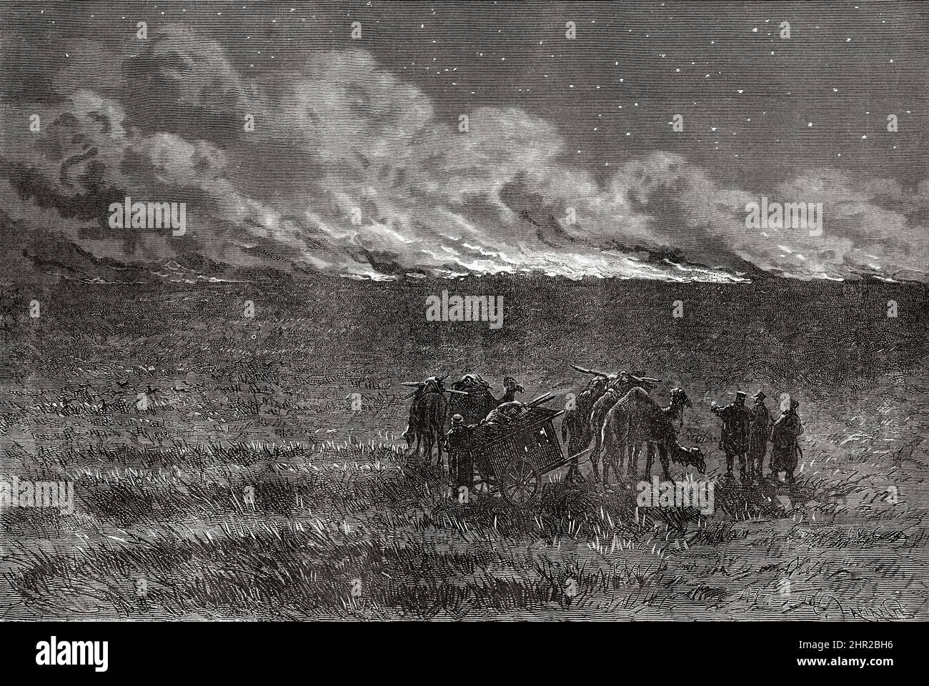 Feu dans les steppes, Mongolie. Asie. Voyage en Mongolie par Nikolai Mijailovich Przewalski en 1870-1873, le Tour du monde 1877 Banque D'Images