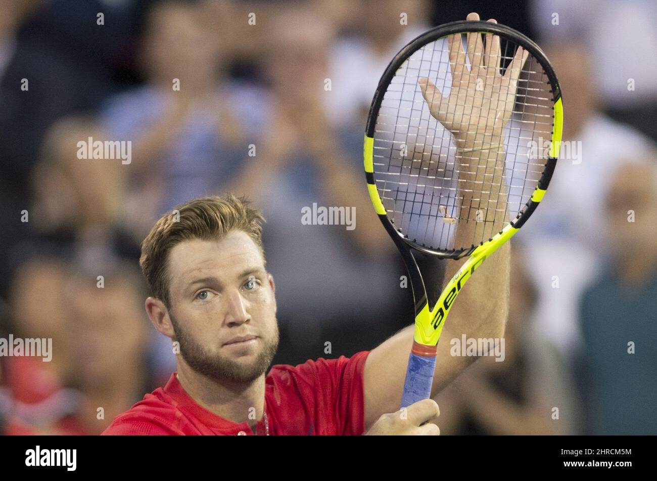 Jack Sock, des ÉtatsUnis, réagit après avoir vaincu PierreHugues