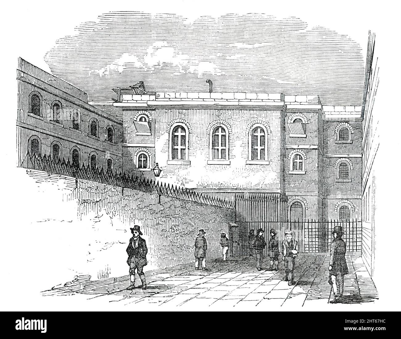 The Chapel-Yard, prison de Newgate, [Londres], 1850. « Le quadrilatère pour les hommes ressemble beaucoup à celui des femmes, mais il est plus grand. Il se compose de deux ou trois verges, et le bâtiment qui les entoure. Aucune séparation des hommes n'est faite autrement que comme l'exige la loi - c'est-à-dire, dans les crimes et les délits". De "Illustrated London News", 1850. Banque D'Images