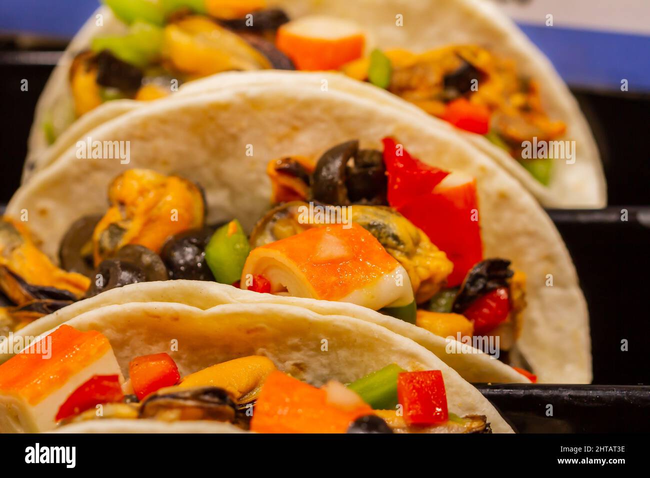 Fruits de mer et arepa de légumes au marché de Boqueria à Barcelone Banque D'Images