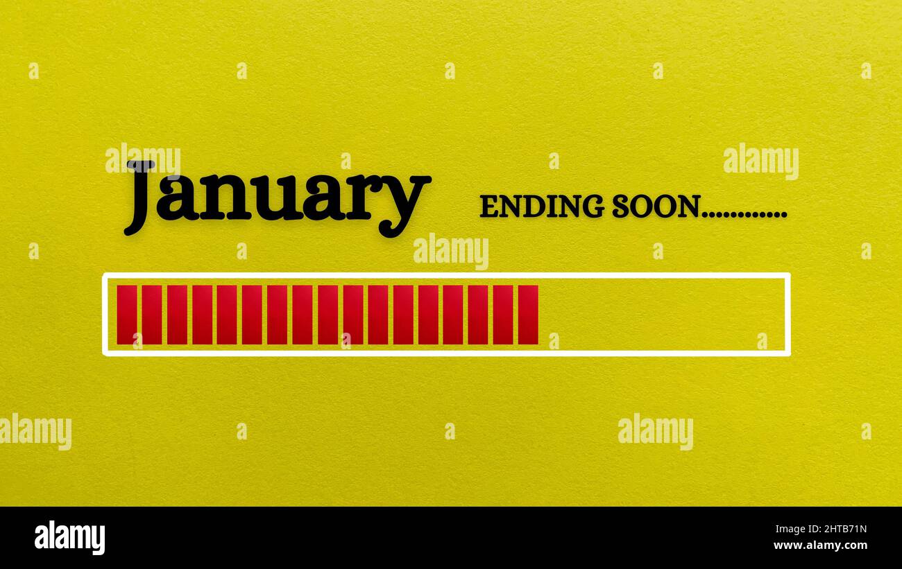 Vue de dessus de la barre de chargement indiquant la fin du mois de janvier avec un arrière-plan en papier jaune. Banque D'Images