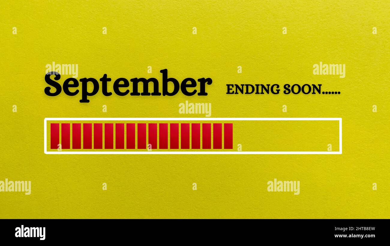 Vue de dessus de la barre de chargement indiquant la fin du mois de septembre avec un arrière-plan en papier jaune. Banque D'Images