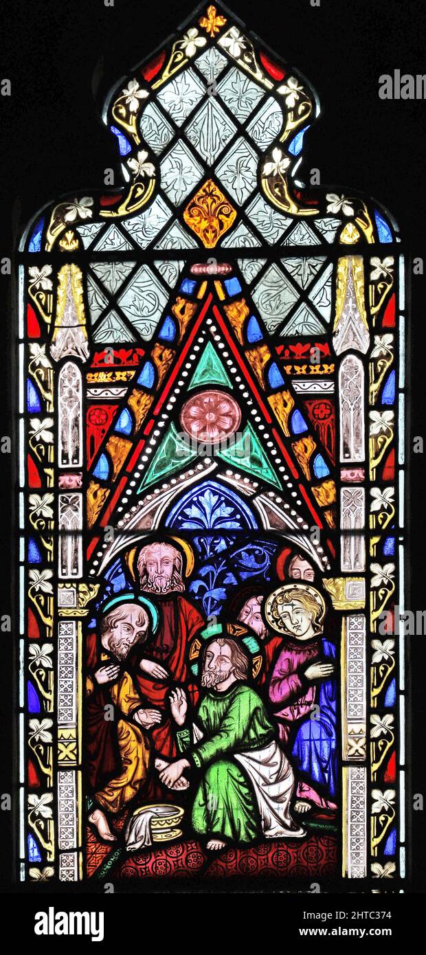 Vitraux de Frederick Preedy représentant les pieds du disciple de Jésus lavant. Église Saint-Laurent, Stretton Grandison, Herefordshire Banque D'Images