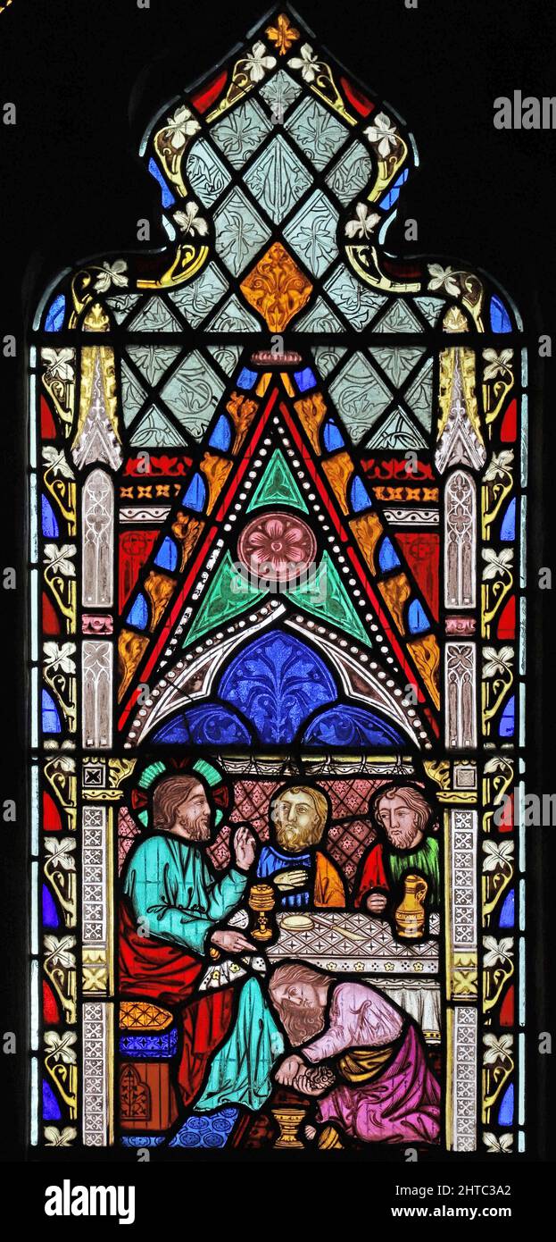 Vitraux de Frederick Preedy représentant Marie lavant les pieds de Jésus. Église Saint-Laurent, Stretton Grandison, Herefordshire Banque D'Images