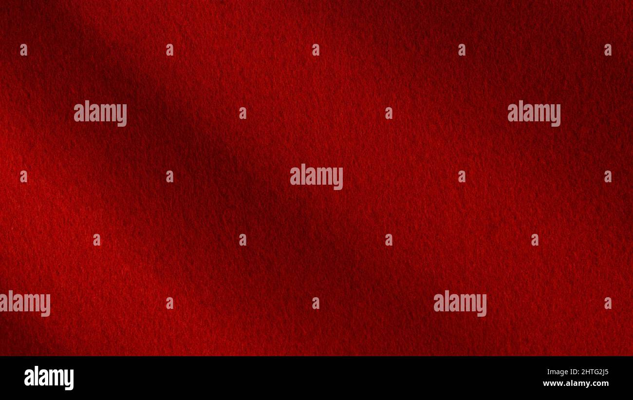 Surface en feutre rouge foncé avec ombres, vue du dessus. Grande texture de macro et arrière-plan Banque D'Images