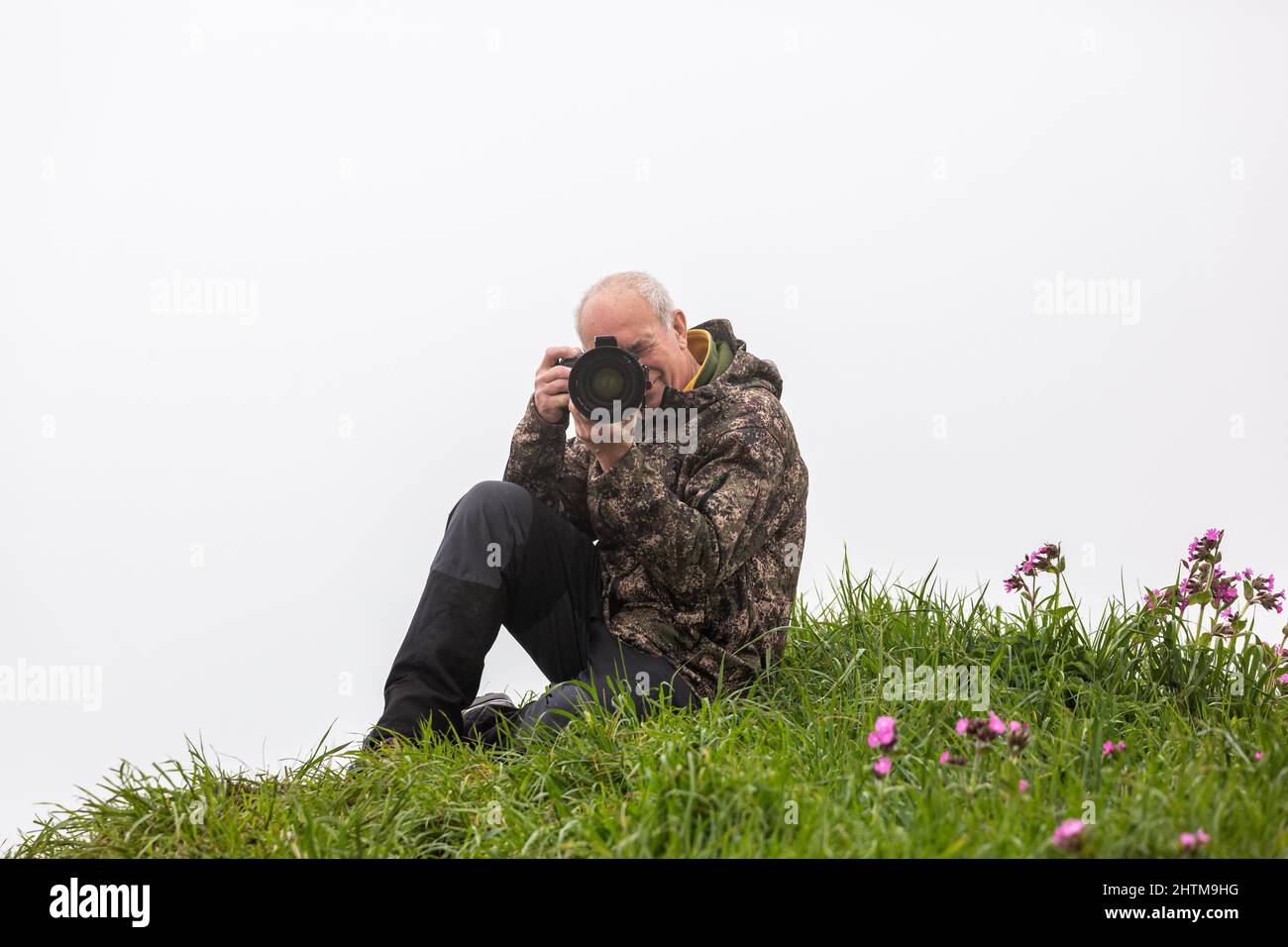 Photographe à Bempton Cliffs Banque D'Images